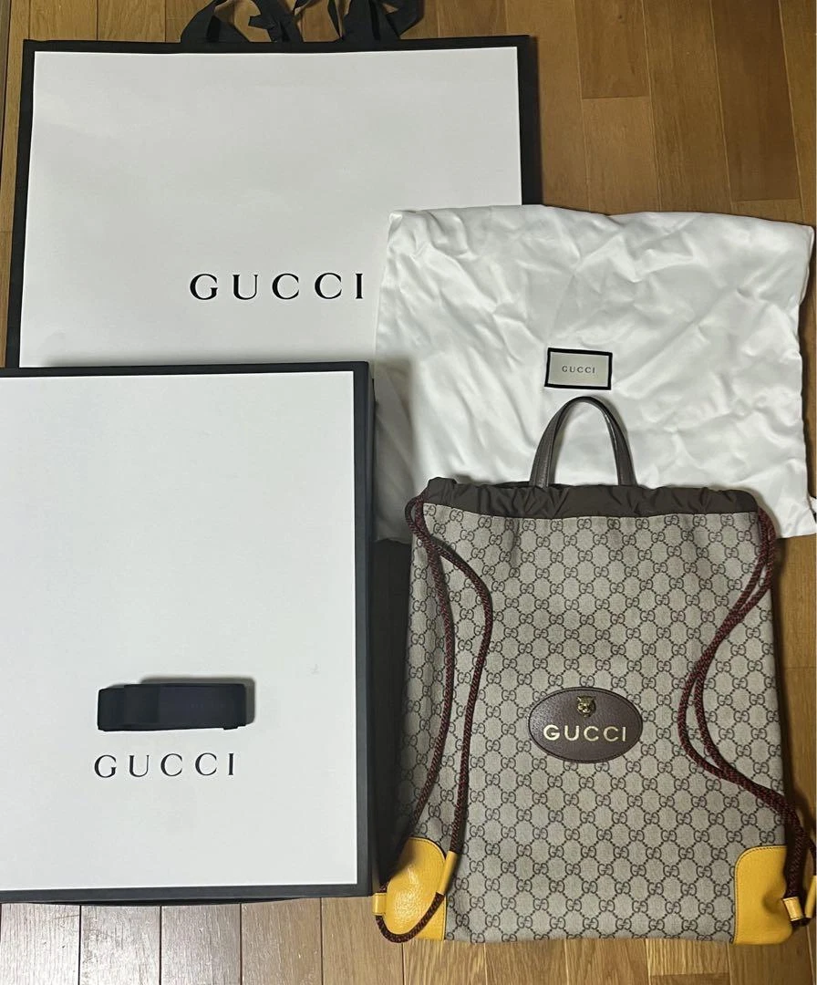 Sac à dos GUCCI cordon GG Supreme beige occasion excellent avec boîte