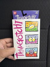  Bandai 1997 Tamagotchi Original Virtual Reality Pet Silver / Grey NIB 1800