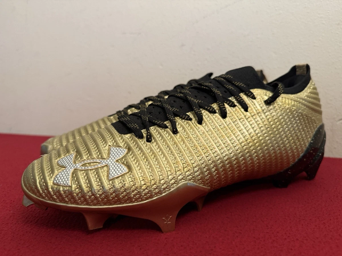 Preços baixos em Under Armour Largura Média (D, M) Dourado