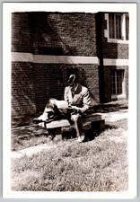 Vtg B&W Snapshot Man In Suit Reading Book On Bench Outside Brick Building 1940s