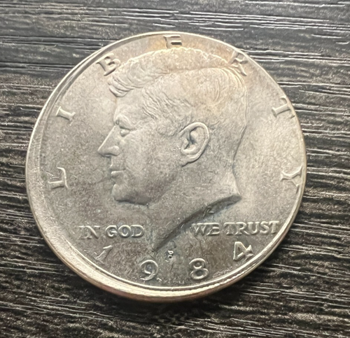 1984-P Kennedy Half Dollar 10-15% Off-Center Strike - Beautiful Coin!