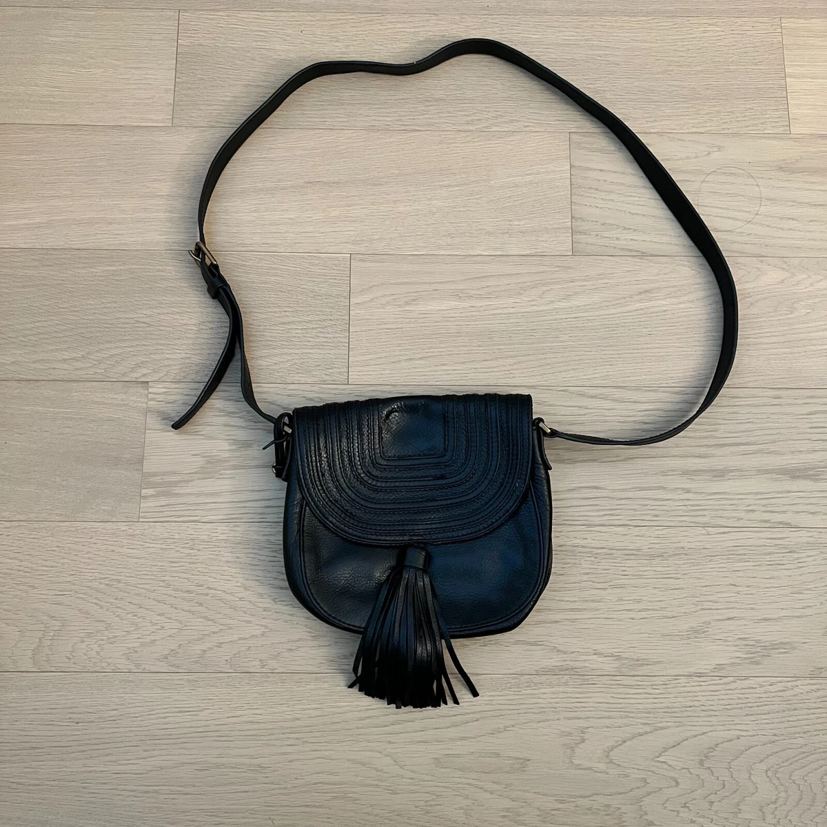 Fossil emi hotsell tassel saddle bag