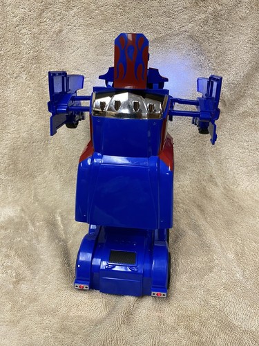 Used. Family smiles  RC Toy Car Transforming Robot With Remote Control. - Picture 12 of 12