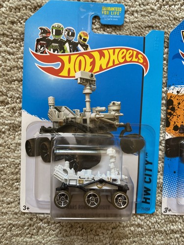 JUEGO DE 2 HOT WHEELS 2012-14 HW CITY MARS ROVER CURIOSITY variantes negras y sucias - Imagen 3 de 9