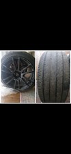A set of 4 12 Spoke 18” Black Rims With 245/40R18 Performance Tires