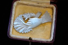 Art Deco Carved Mother of Pearl Hand Holding Flowers Plague