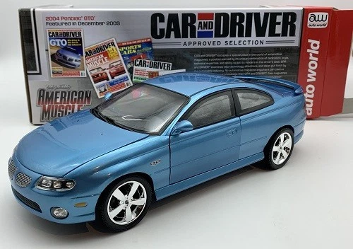 Pontiac GTO 2004 CAR and DRIVER Selection im Maßstab 1:18 Auto World OVP NEU - Bild 1 von 4