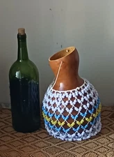 sekere (medium Yoruba-style netted gourd rattle)