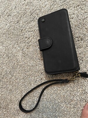 Black wrist wallet with optional Strap To Put Over Your Shoulder. Womens.