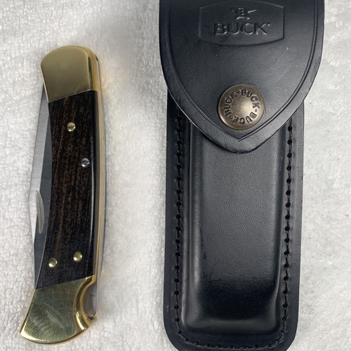Buck® 110 Folding Hunter Lock-back Knife, Brass Bolster with Leather Sheath - Picture 8 of 8
