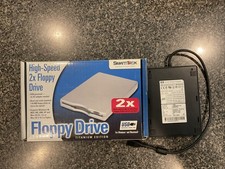 LOT OF 2 FLOPPY DISK DRIVES. ONE NEW AND 1 US...