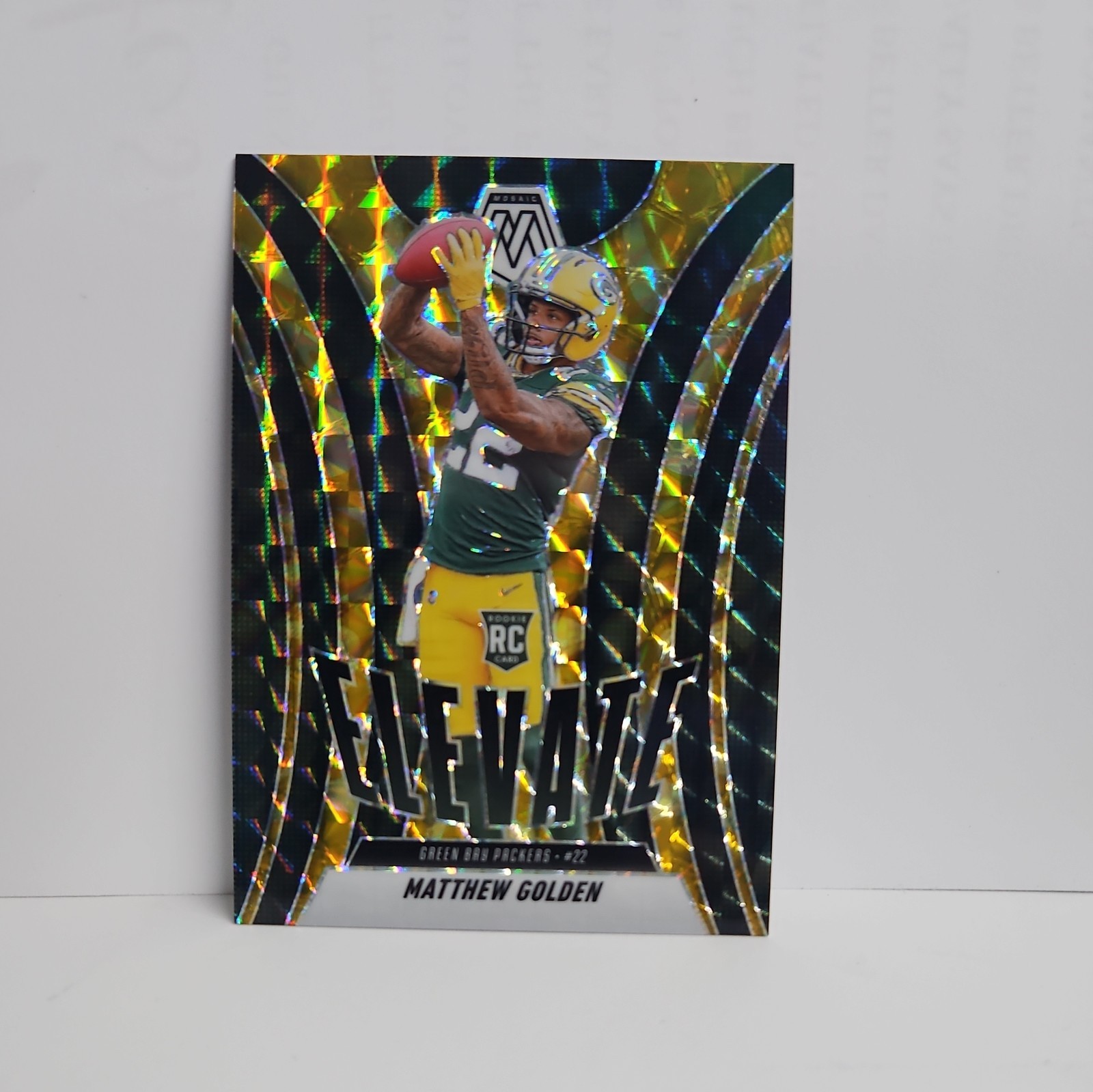 2025 Panini Mosaic Matthew Golden Elevate Yellow React Prizm 28/89 #3 RC