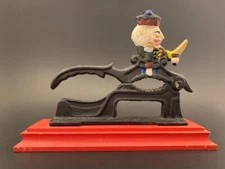 Toy Soldier Nutcracker Cast Iron on Wood base Collectable Christmas Decor Retro