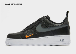 black and grey nike trainers