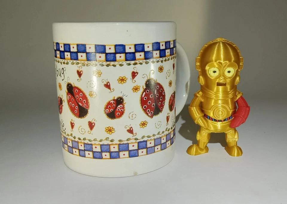 Mini estatuilla miniatura C-3PO modelo Star Wars brazo rojo Foto 2 de 4