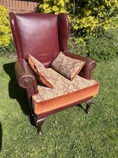 ANTIQUE WINGBACK LEATHER ARMCHAIR