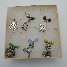 Wine glass charms, Holiday décor.  Santa, tree, hand-made, glass & crystals.