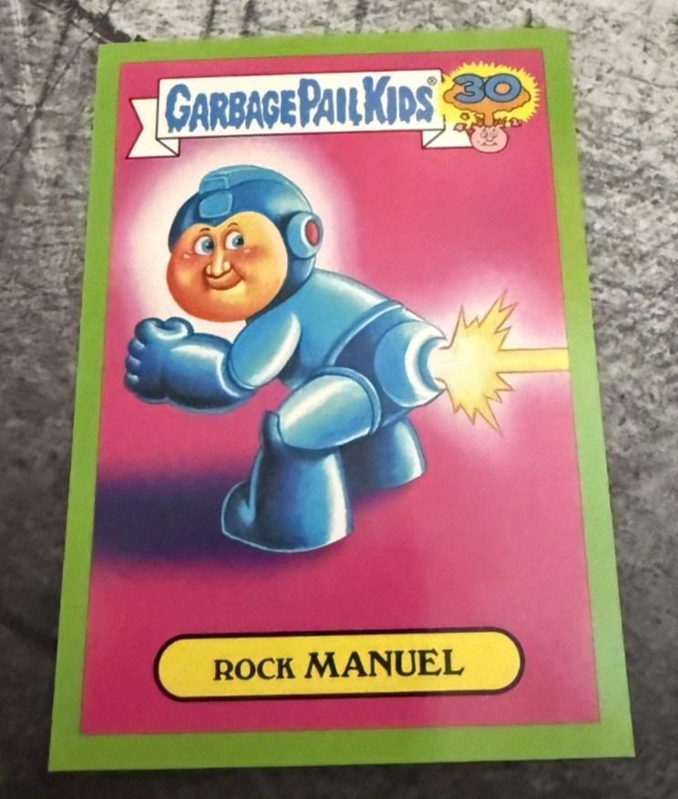 Rock MANUEL #16b 2015 Garbage Pail Kids 30th Anniversary trading card — raw and PSA graded price guide