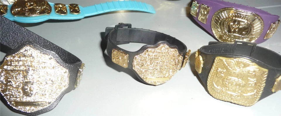 Lote de cinturones de título de campeonato WWE Jakks para figuras de acción de lucha libre sueltas LEER Foto 4 de 4