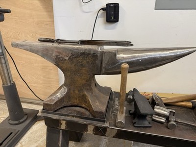 Blacksmithing Anvil on Steel Stand with Bench Vise and Hammers