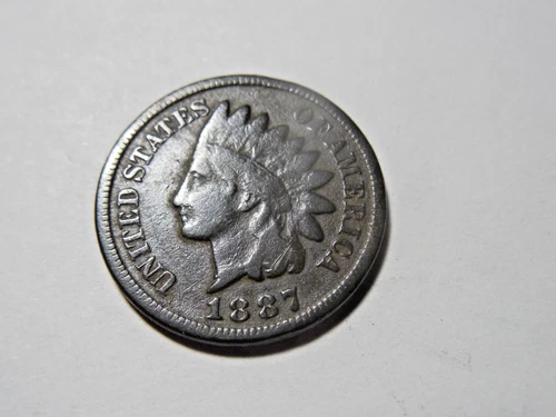 1887 Indian Head Penny in VG condition.  Solid rim and coin.  But you decide!!!