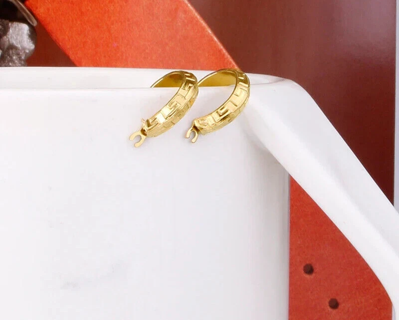 LOUIS VUITTON Metal Nanogram Hoop Earrings Gold | FASHIONPHILE