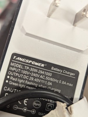 TANGSPOWERBattery ChargerMODEL:TP-30W-2941000INPUT:100V-240V AC, 50/60Hz 0
