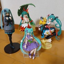 Hatsune Miku Figure Set of 4 Collectible Anime Figures Slight Wear Authentic
