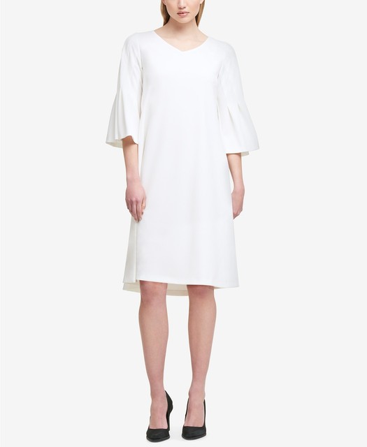 white trumpet sleeve dress