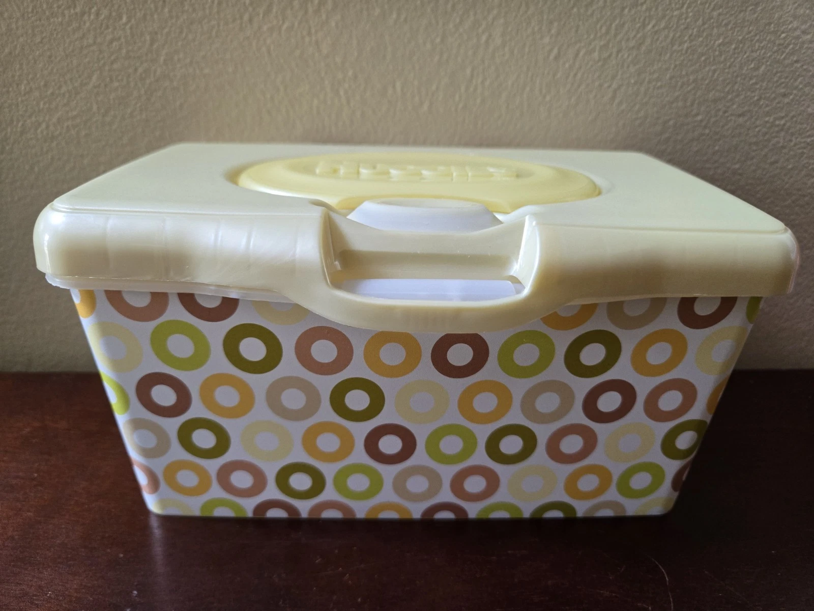 Huggies baby wipes container brown green yellow circle design yellow pop-up box