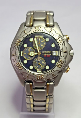 0560-H02829 CITIZEN ECO DRIVE TWO TONE GOLD TITANIUM WATCH FOR MEN C5-26