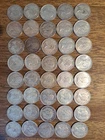 New Listing80% Silver Canadian quarters - Roll of 40 coins