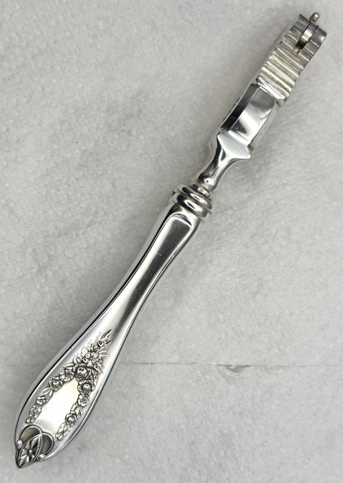 1911 Triple Silver-Plated Nutcracker by 1847 Rogers Bros in “Old Colony” Pattern