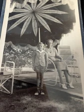 1940 RPPC Postcard "Grandson Pete & Grandma Isabelle backyard near the water"