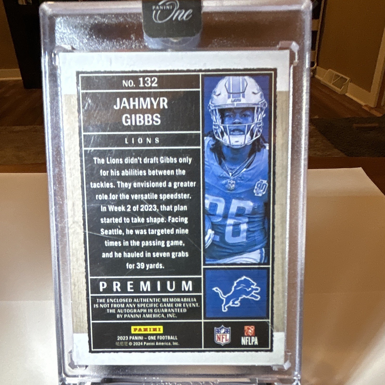 2023 Panini One Football Jahmyr Gibbs RC Auto Patch /99 #132 Encased view 2