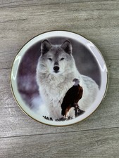 Assiette de collection en céramique loup et aigle oie bleue 8,5 en bordure dorée
