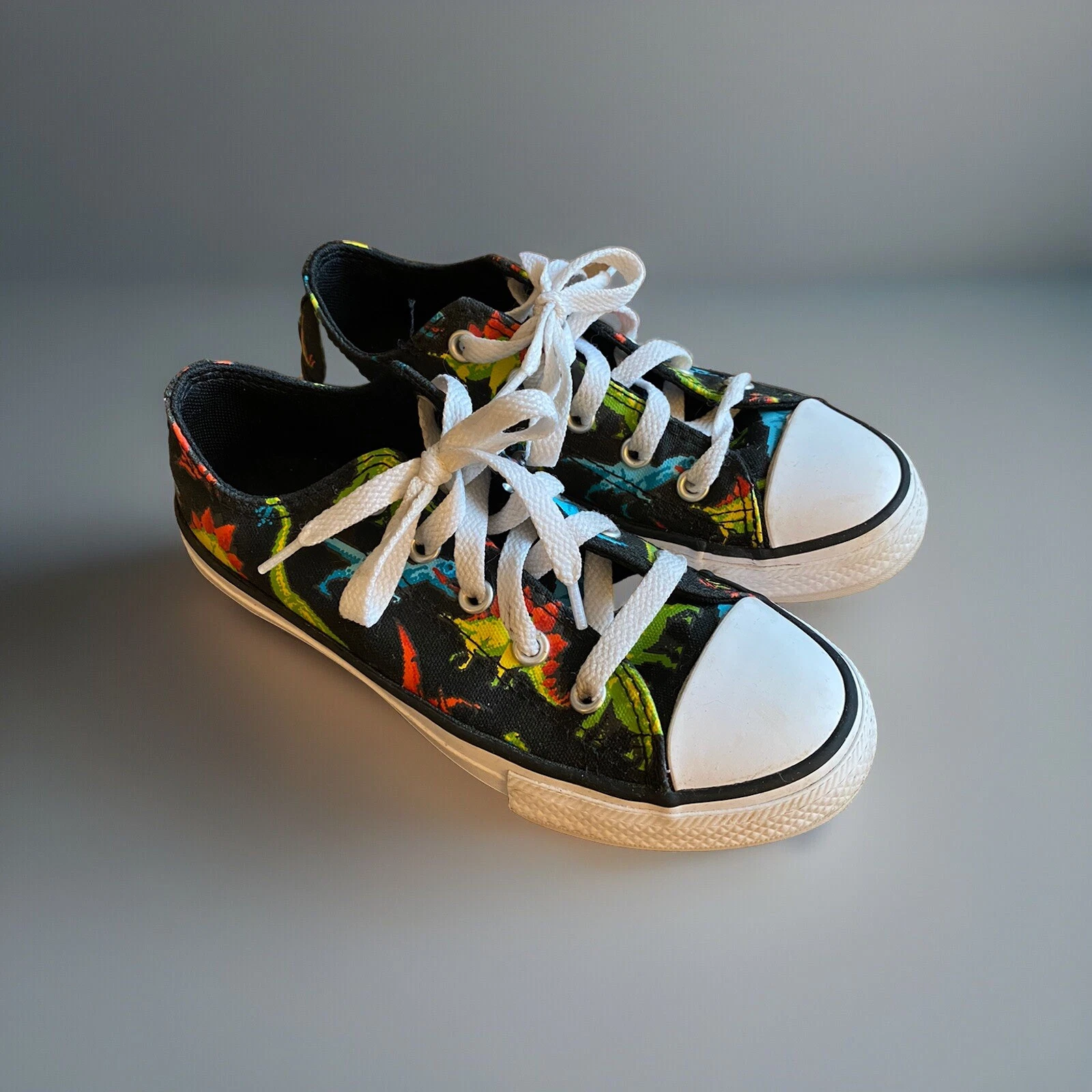 Dinosauri arcobaleno colore primario bambino taglia 13 nero Converse All Star Low
