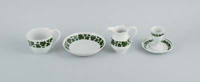 Meissen. Green Ivy Vine. Four parts: egg cup, cup, saucer and cream jug