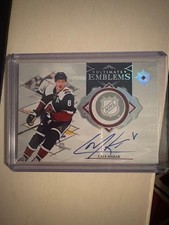 2023-2024 ultimate emblems on card auto Cale Makar