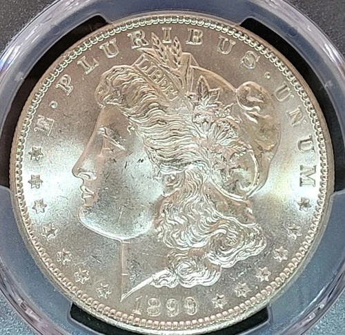 1899 O Morgan Silver Dollar Graded MS66 By PCGS. SERIOUSLY UNDERGRADED