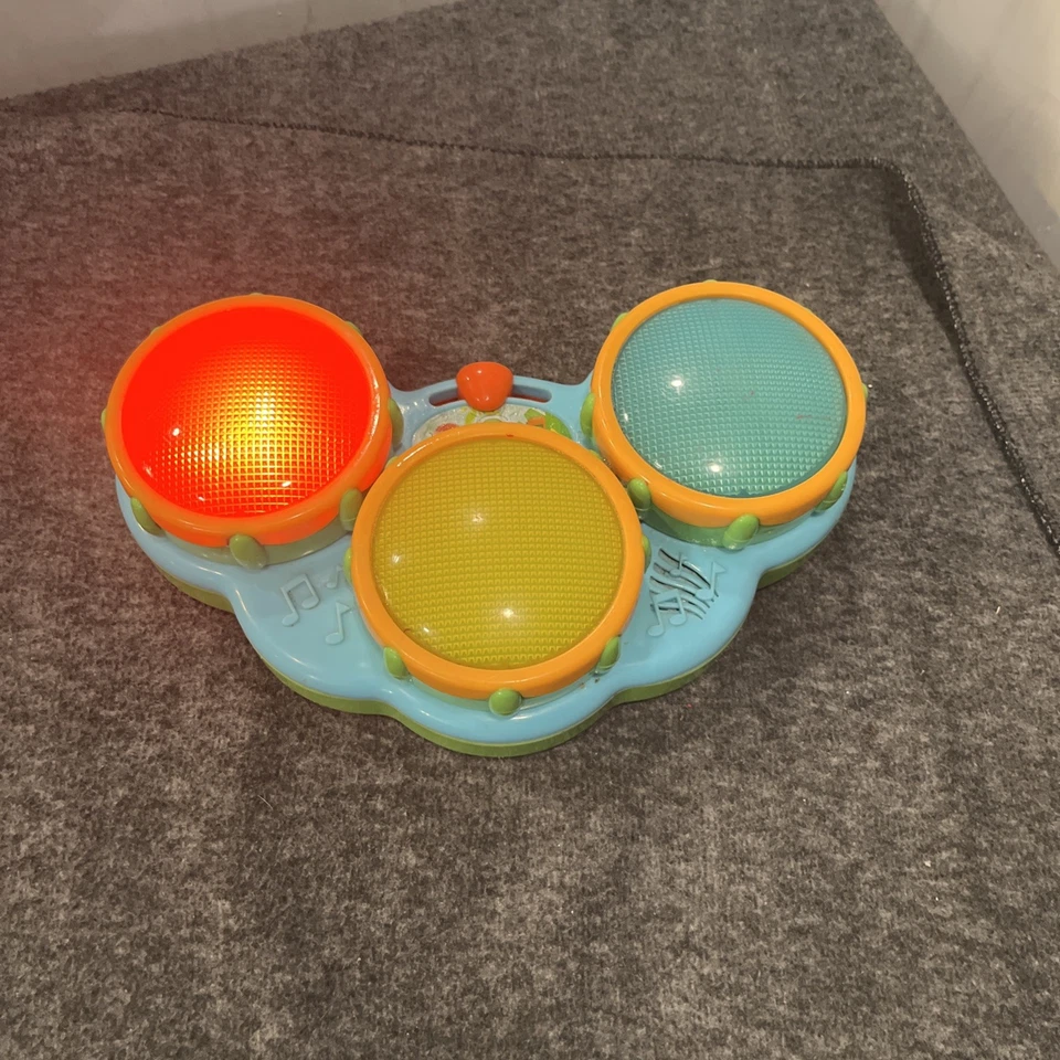 Juguete de batería KIDS II con luces y sonido - rojo, amarillo, azul - probado funciona Foto 2 de 4