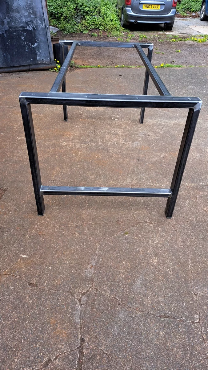 Table with steel frame deals