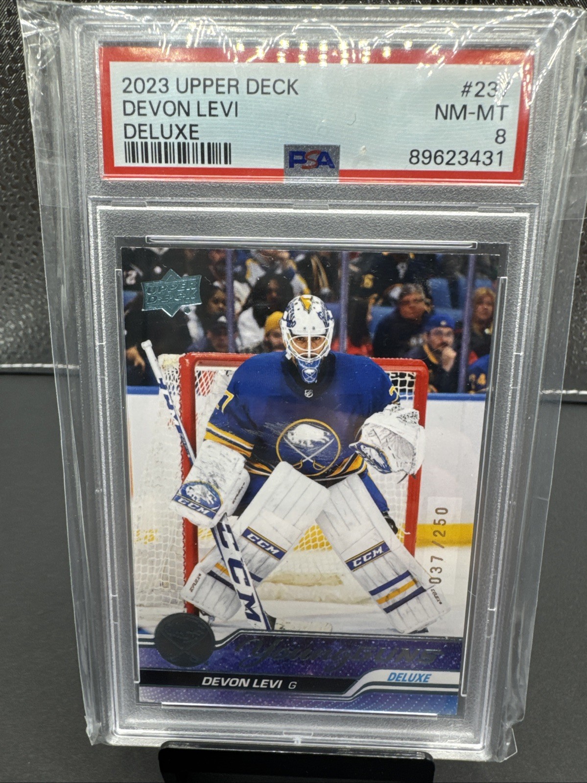 2023-24 Upper Deck Series 1 Hockey Devon Levi Young Guns Deluxe #037/250 PSA 8