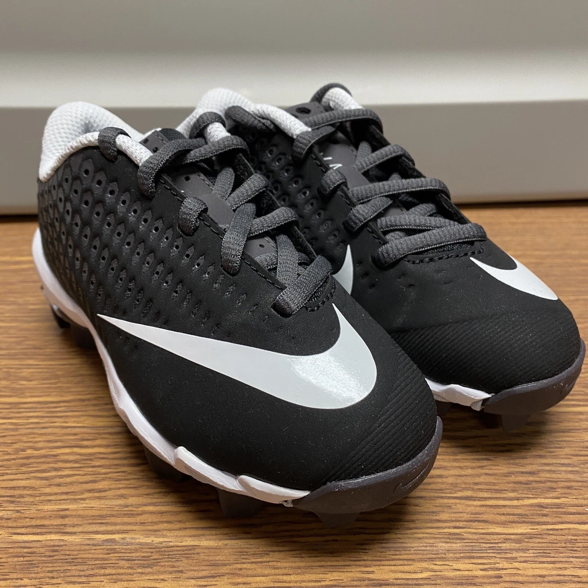 Kids wide cleats sales
