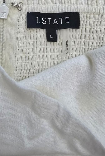 White Wide-Leg Linen Jumpsuit With Adjustable Spaghetti Straps & Smocked Back By - Picture 3 of 5