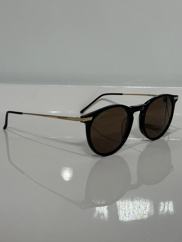 NUEVO EN CAJA Gafas de sol Calvin Klein CK22528TS 001 negras redondas acetato titanio 51 mm Foto 2 de 4