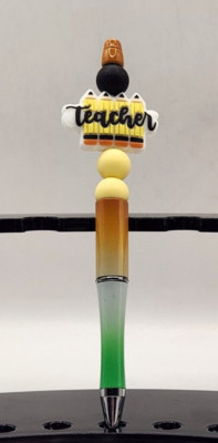 Green and orange pen base W/ Yellow accent beads and a Teacher focal bead