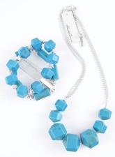 Set collana e bracciale Kenneth Cole New York tono argento perle finte turchesi