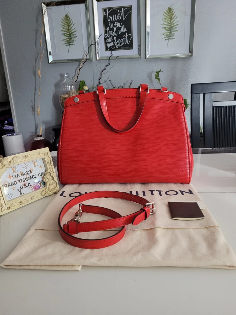 louis vuitton bag with red handles