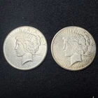 Lot of two (2) 1927 Peace Silver Dollars $1 US Silver Dollar